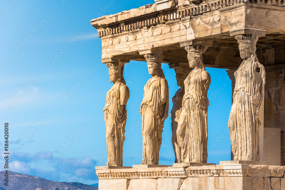 Karyatides statues, Erehtheio, on the Acropolis in Athens, Greece - obrazy, fototapety, plakaty 