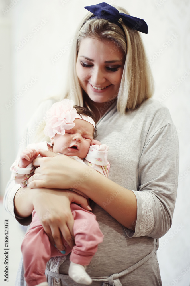 the mother and the newborn baby closeup the mother and the newborn baby closeup