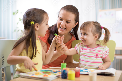 Children and mother with fi...