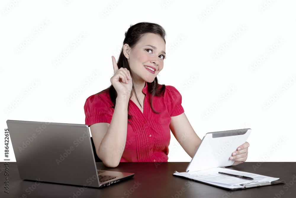 Pensive businesswoman using a tablet on studio Pensive businesswoman using a tablet on studio