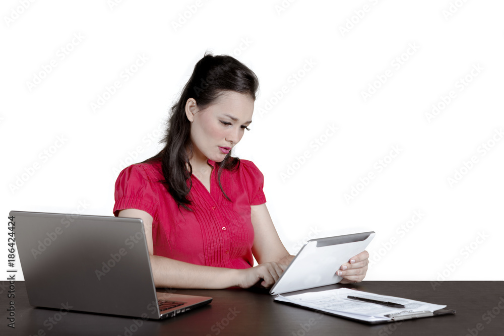 Caucasian businesswoman working with digital tablet Caucasian businesswoman working with digital tablet