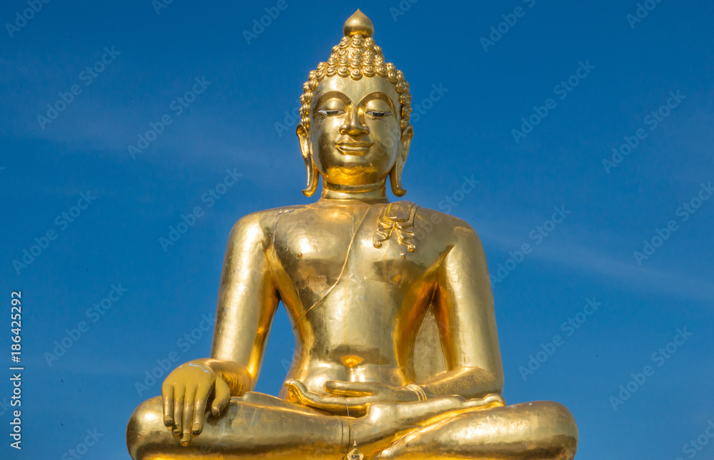Gold Buddha statue near the Golden Triangle in northern Thailand Gold Buddha statue near the Golden Triangle in northern Thailand