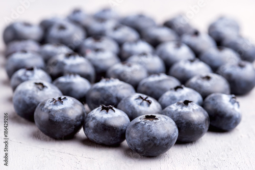 Close Up of Fresh and Tasty Blueberries on Background