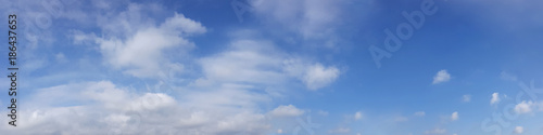 Vibrant color panoramic sky with cloud on a sunny day. Beautiful cirrus cloud. Panorama high resolution photograph.