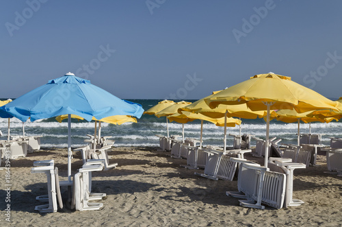 Colorful Beach Umbrellas against the blue sky © nerksi