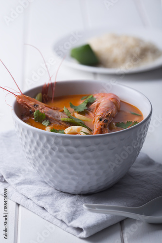Traditional Thai soup Tom Yam. Vertical orientation photo