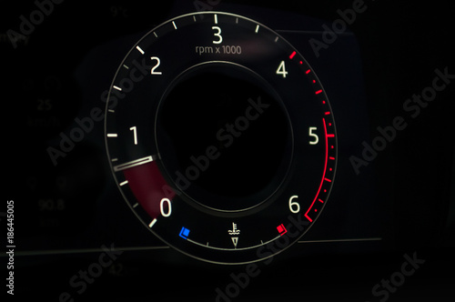 Tachometer in the new car. Digital.