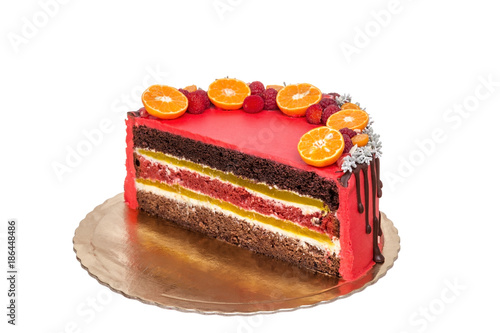 Fototapeta Naklejka Na Ścianę i Meble -  Delicious red fruit and chocolate cake in a cut.