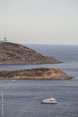 Corsica, 03/09/2017: Punta di Revellata, il promontorio lungo la costa nord occidentale dell'isola, a ovest della città di Calvi, con vista del faro di Revellata, faro marittimo inaugurato nel 1844 photo