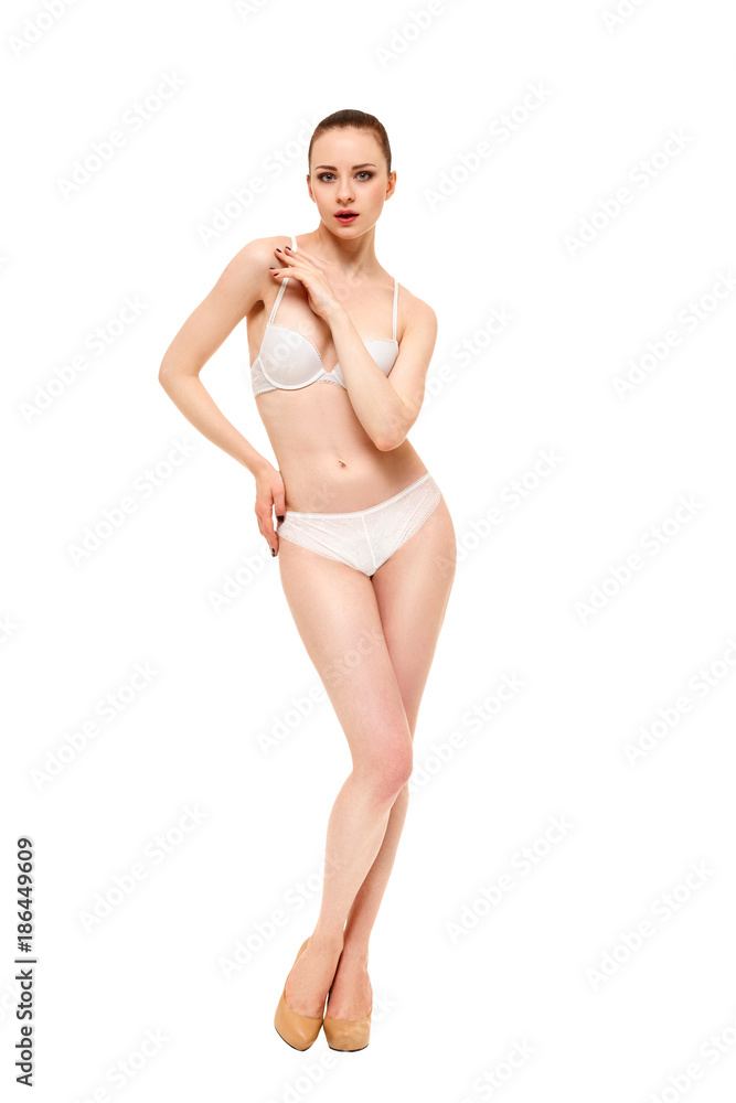 Beautiful underwear model posing on a white background Beautiful underwear model posing on a white background