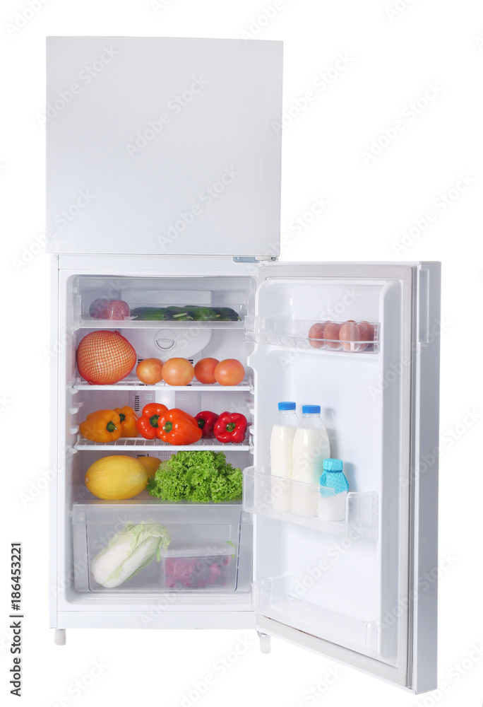 Open refrigerator full of food on white background Open refrigerator full of food on white background