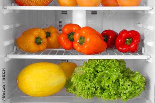 Refrigerator full of vegetables and fruits