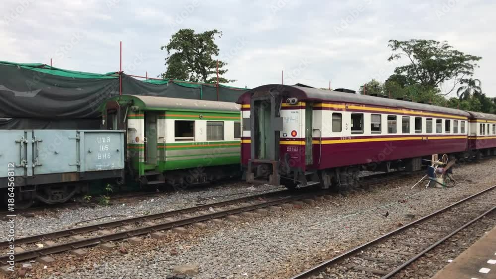 Train arriving at Thonburi train station in Bangkok Thailand Train arriving at Thonburi train station in Bangkok Thailand