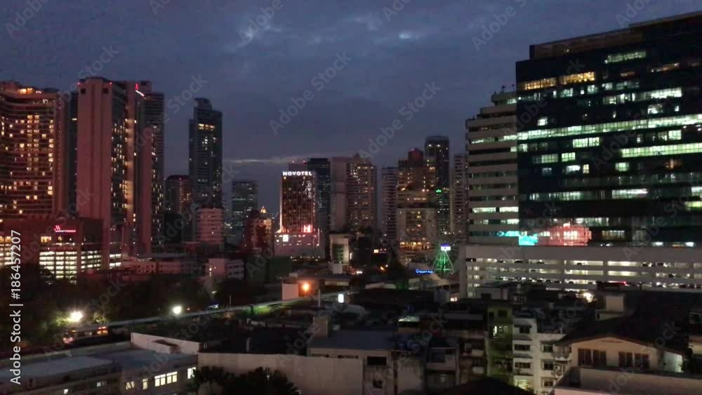 BTS train passing by during evening in Bangkok Thailand BTS train passing by during evening in Bangkok Thailand