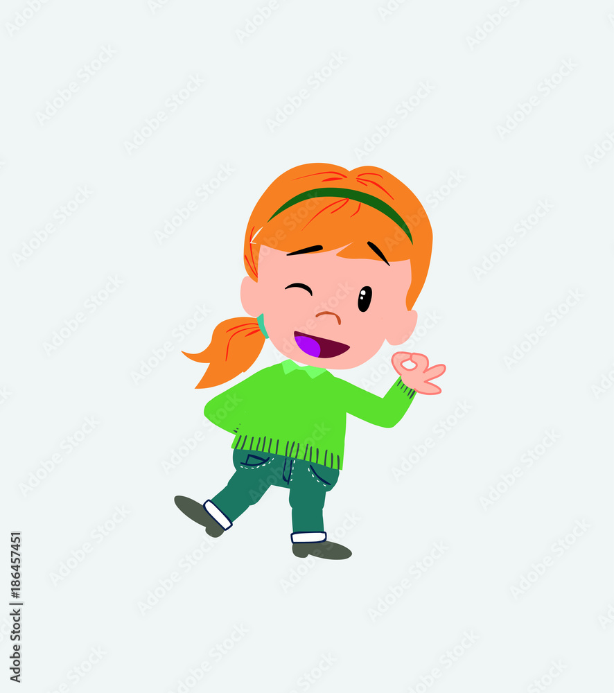 White girl with sweater doing the OK sign with his hand. White girl with sweater doing the OK sign with his hand.