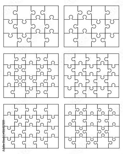 Separate pieces of six white jigsaw puzzles
