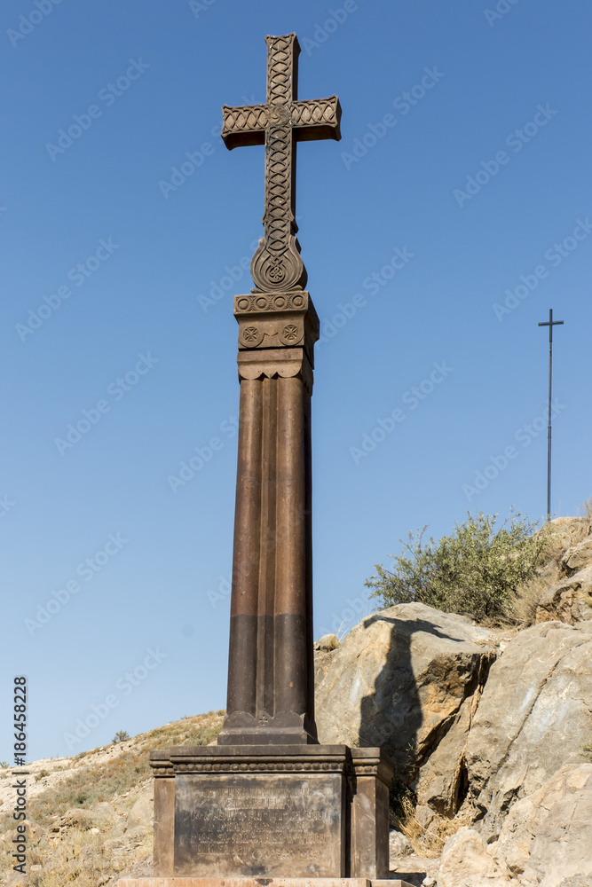 Old cross on the hill above the Khor Virap monastery in Armeni. Old cross on the hill above the Khor Virap monastery in Armeni.