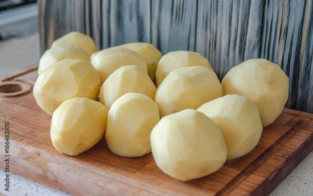 raw peeled potatoes