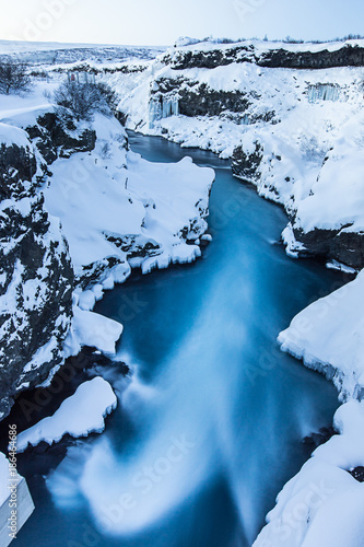 Hraunfossar waterfall in wi...