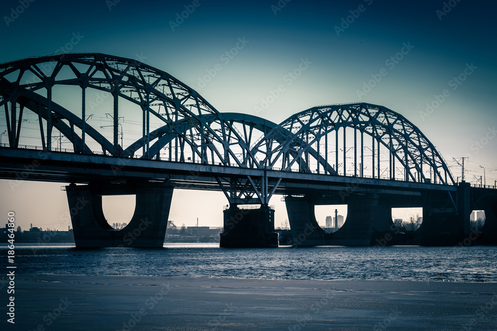 Obraz premium Darnitsky bridge, city winter sunset panorama, Kyiv, Ukraine