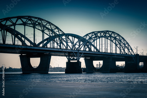 Darnitsky bridge, city winter sunset panorama, Kyiv, Ukraine