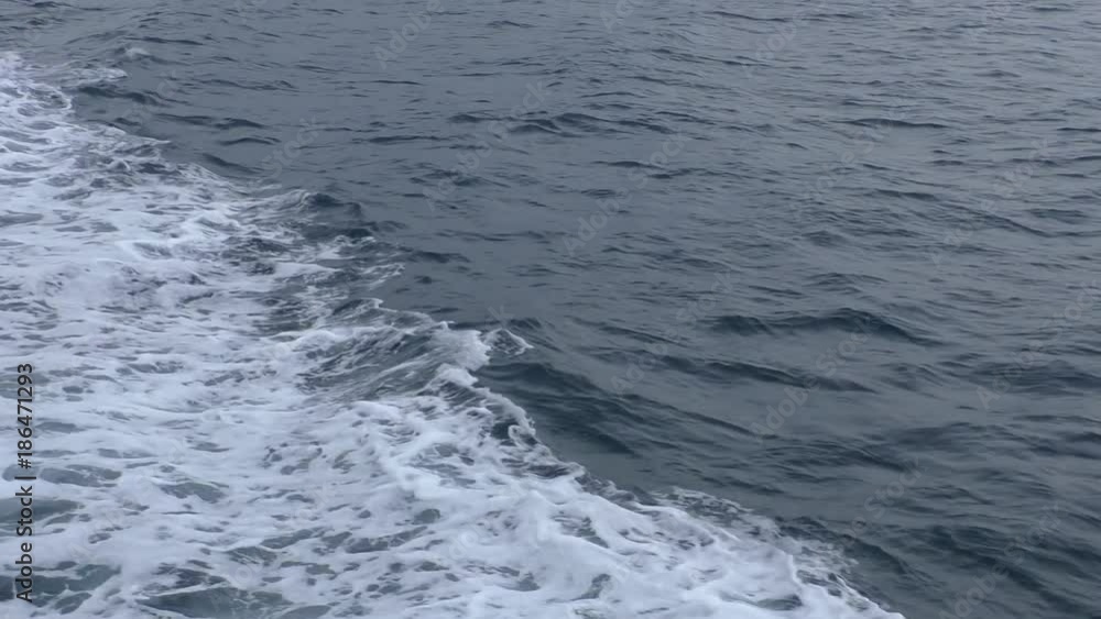 Abstract speed boat ship travel vacation ferry motion background - diagonal foam in the sea trail left by fast motorboat Abstract speed boat ship travel vacation ferry motion background - diagonal foam in the sea trail left by fast motorboat