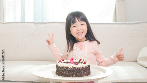 cute girl with birthday cake
