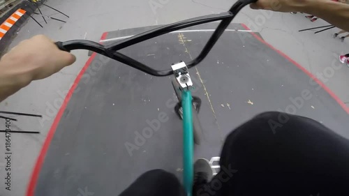 bmx pov rider 360 downside tailwhip jump slow motion photo