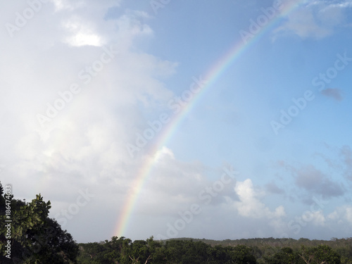 a rainbow in the sky after a rain