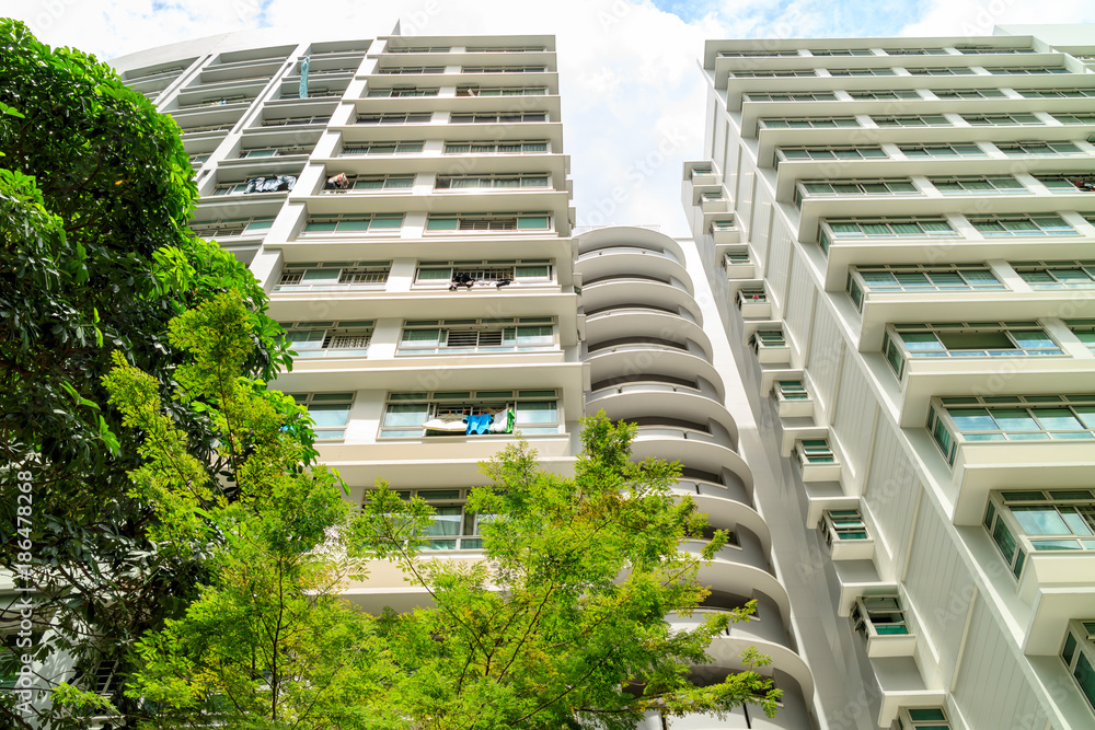 low angle view of Singapore Public Housing Apartments in Punggol District, Singapore. Housing Development Board(HDB), low-rise condominium low angle view of Singapore Public Housing Apartments in Punggol District, Singapore. Housing Development Board(HDB), low-rise condominium