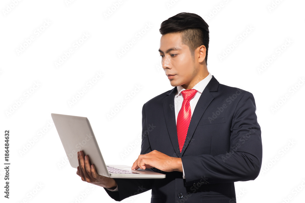 Asian business using laptop computer isolated on white background Asian business using laptop computer isolated on white background