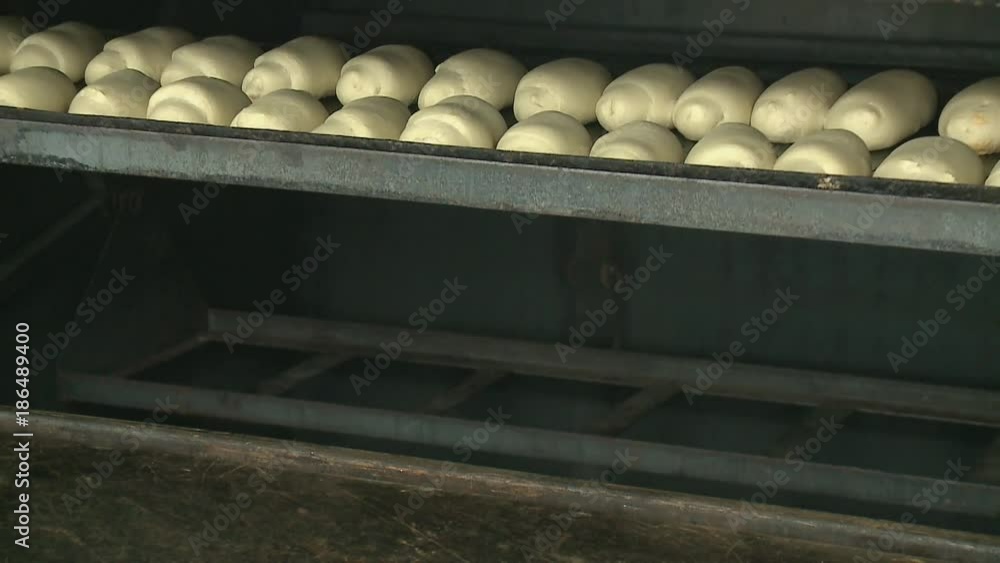 fresh bread in the bakery. baking process fresh bread in the bakery. baking process