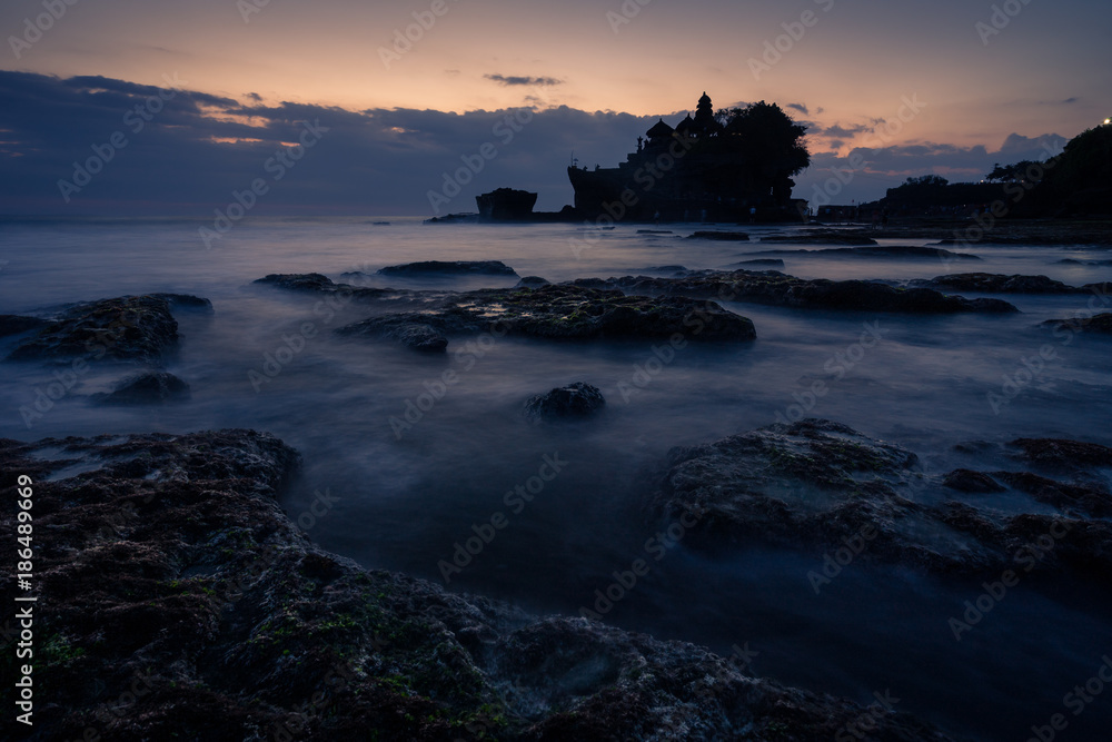 Tanah lot temple, landmark of Bali island at sunset, Indonesia