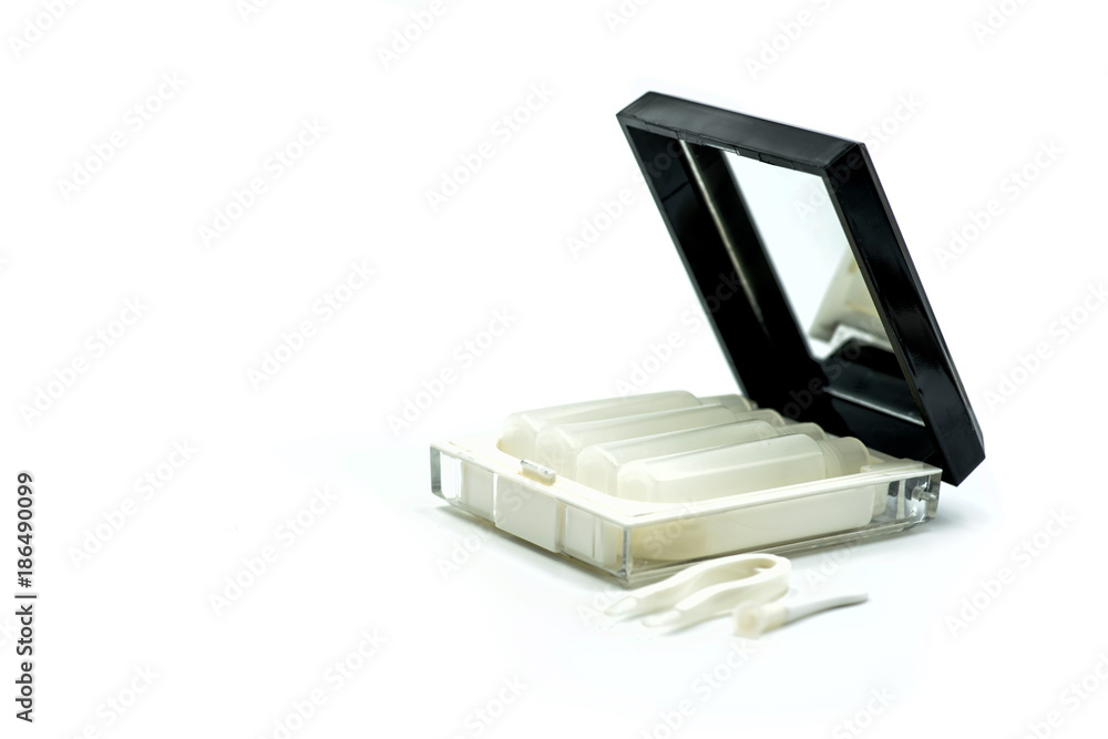 contact lenses set with a container, bottles and tweezers isolated on white contact lenses set with a container, bottles and tweezers isolated on white