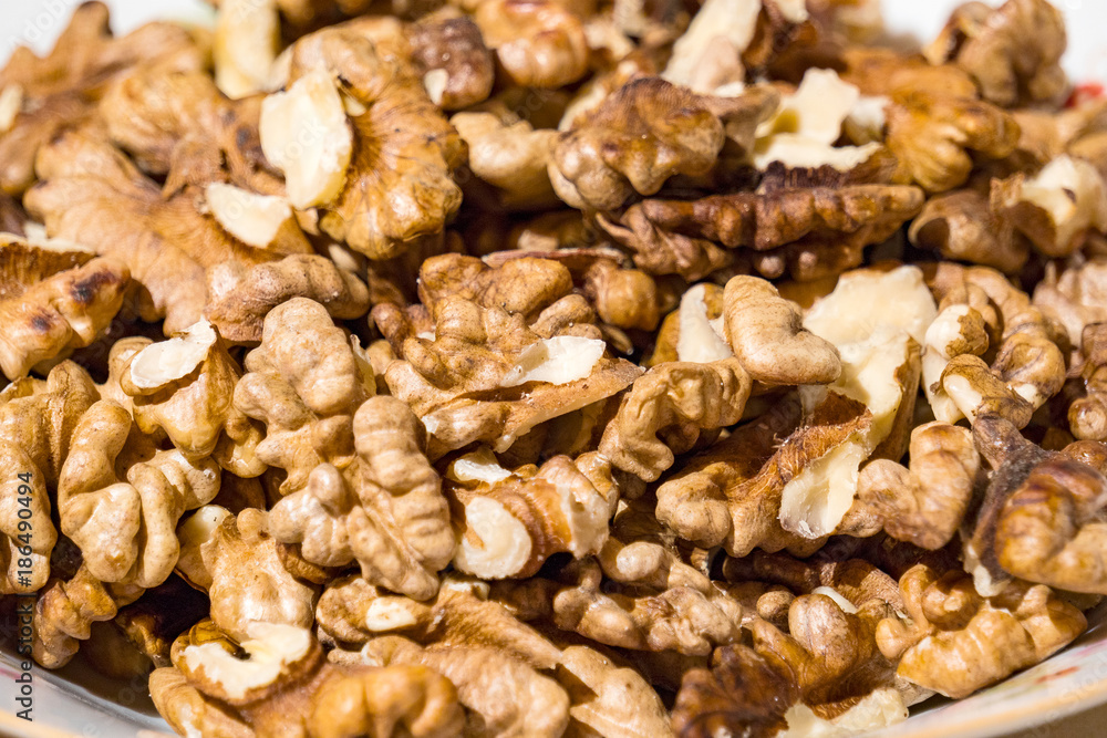 Kernels of walnuts on the plate. Kernels of walnuts on the plate.