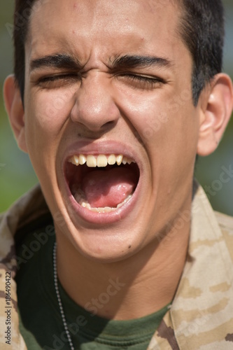 Stressed Young Male Soldier