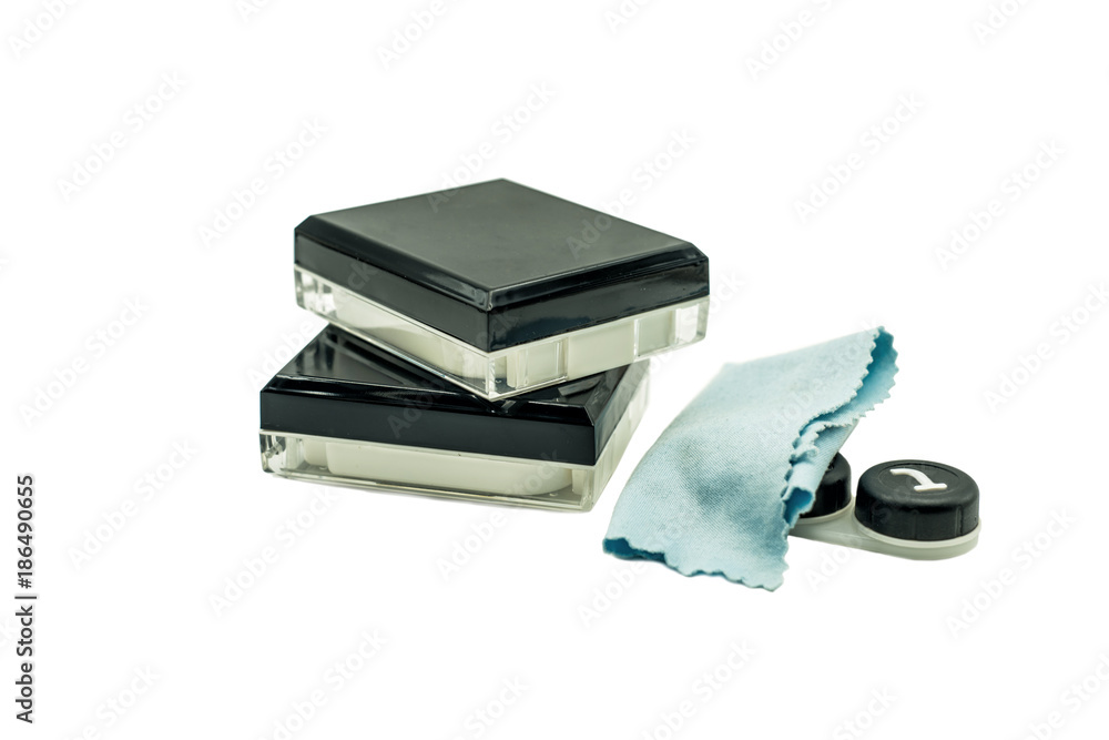 contact lenses sets with a container, bottles,soft cloth and tweezers isolated on white contact lenses sets with a container, bottles,soft cloth and tweezers isolated on white
