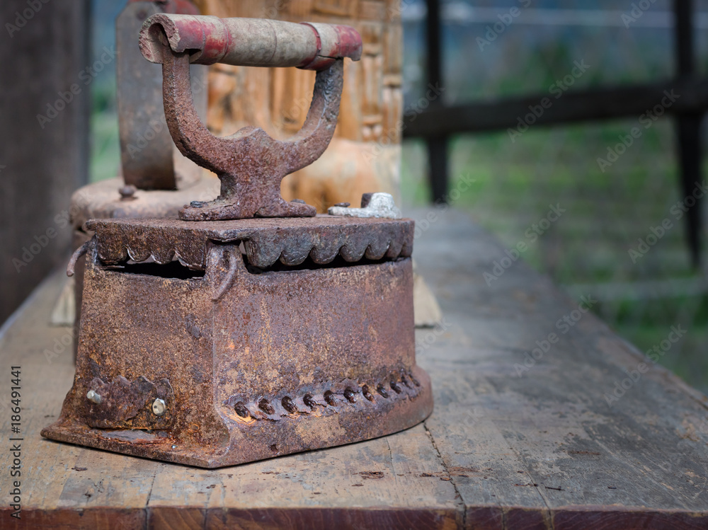 old iron on wood table old iron on wood table