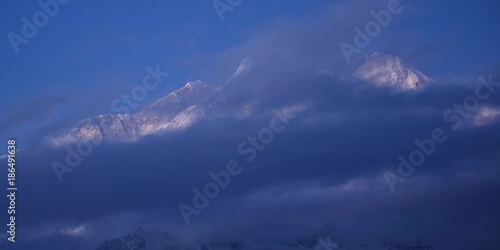 clouds view in the morning of Chomo Lonzo (Makarau's main peak) in Tibet, China photo