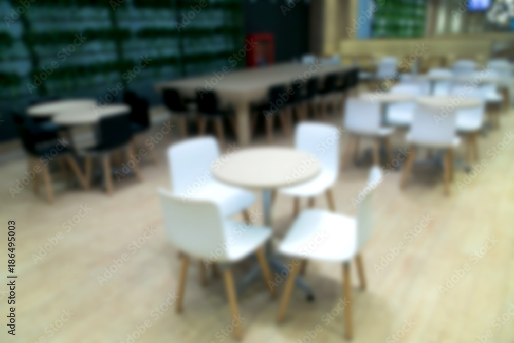 Blur photo Empty table and chair in canteen, cafeteria interior