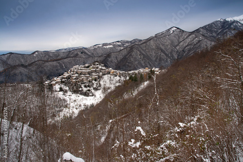 Snow-covered cycling route to Monte Coronato in the province of Lucca, Tuscany photo