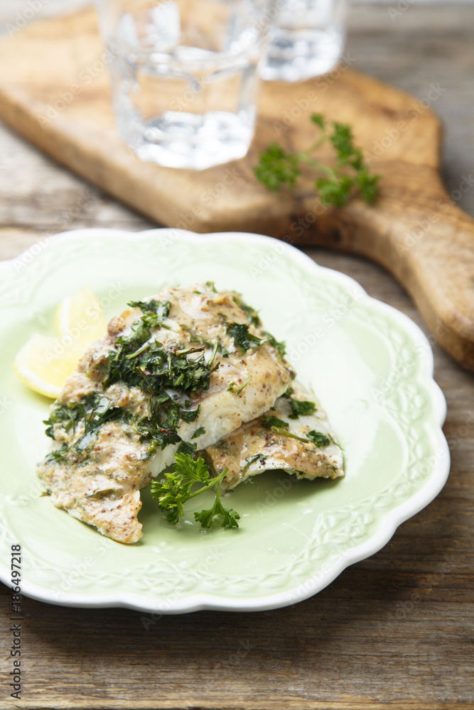 Baked fish with lemond and herbs