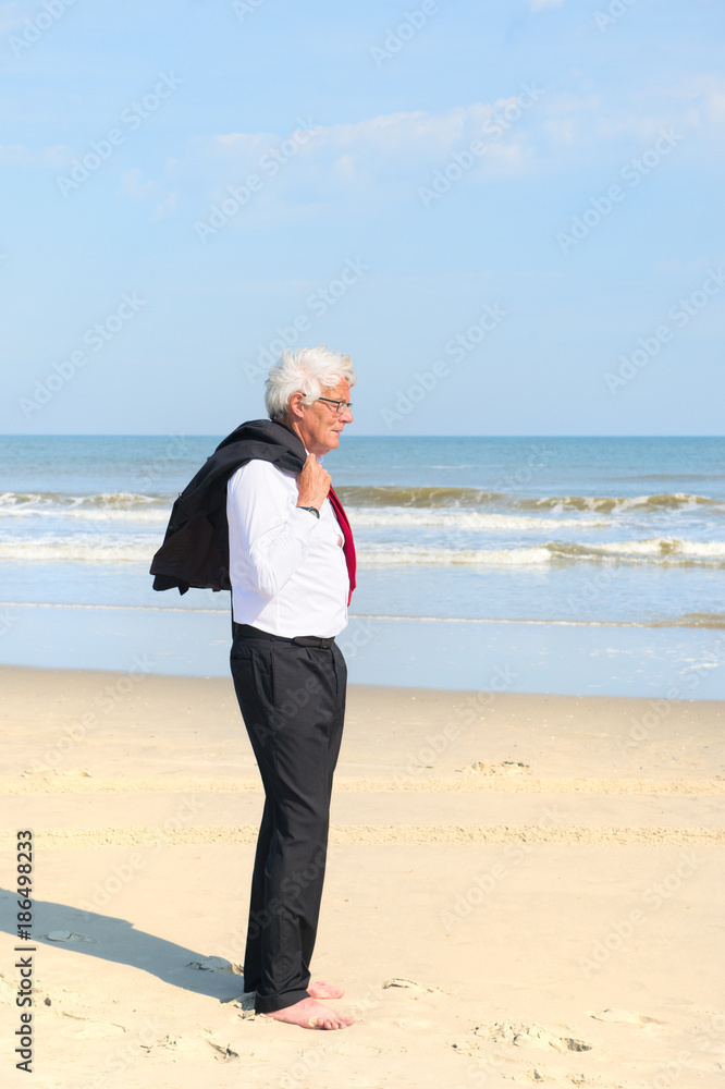 Business man at the beach