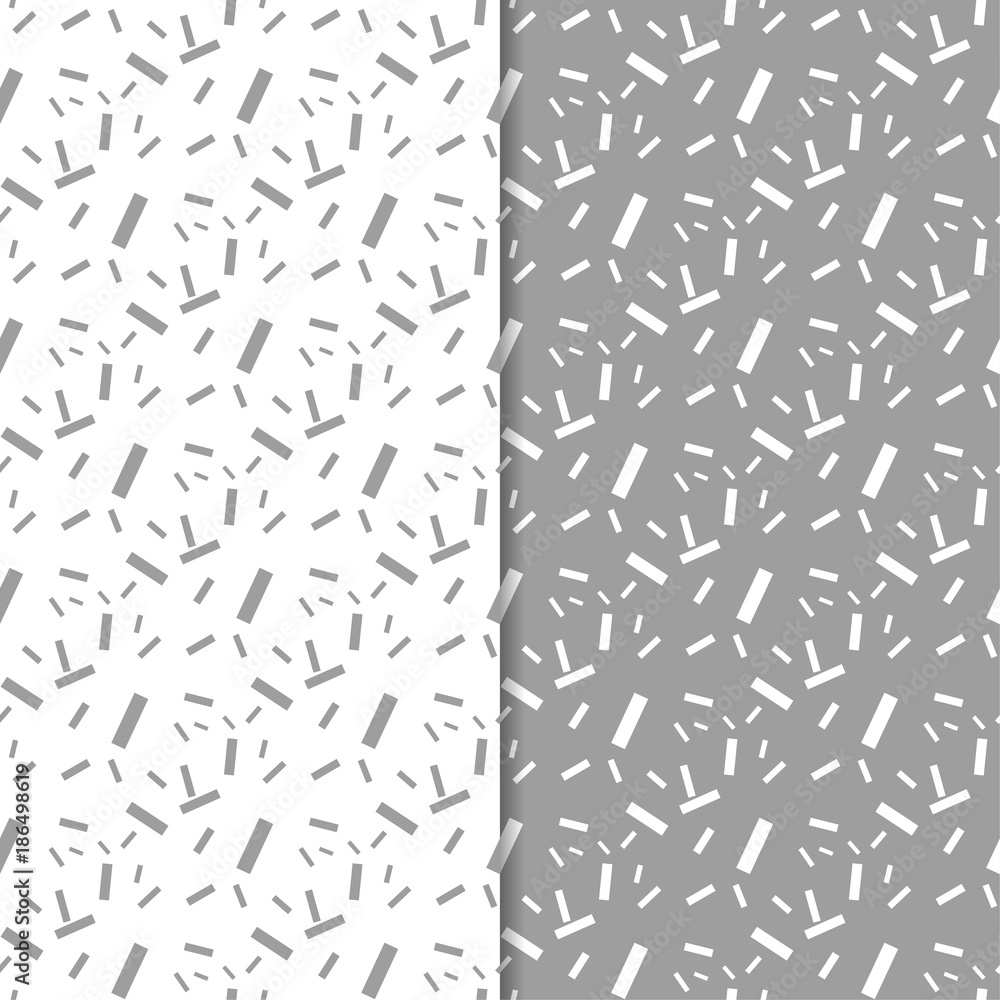 Gray and white geometric set of seamless patterns