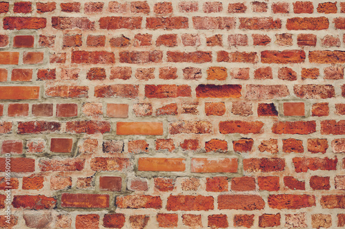 old wall brick background. Mortar. Orange wall color background. Vintage wall