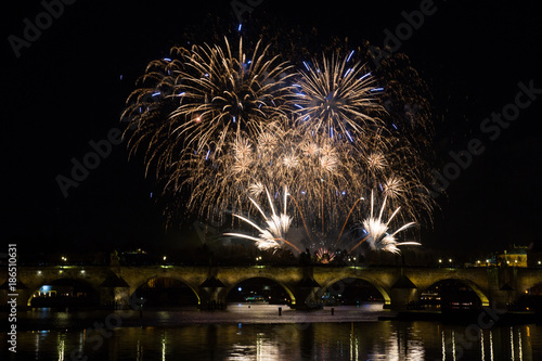 Colorful firework in Prague on New Year celebration photo