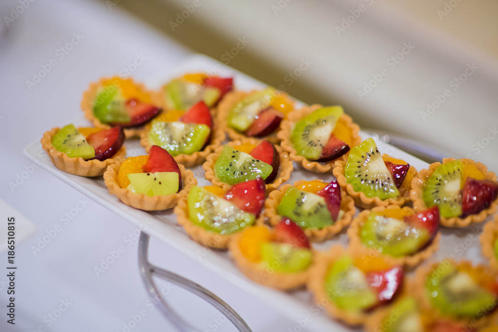 wedding catering food. mini canapes food. tasty dessert. Beautiful decorate catering banquet table. snacks and appetizers. wedding celebration wedding catering food. mini canapes food. tasty dessert. Beautiful decorate catering banquet table. snacks and appetizers. wedding celebration