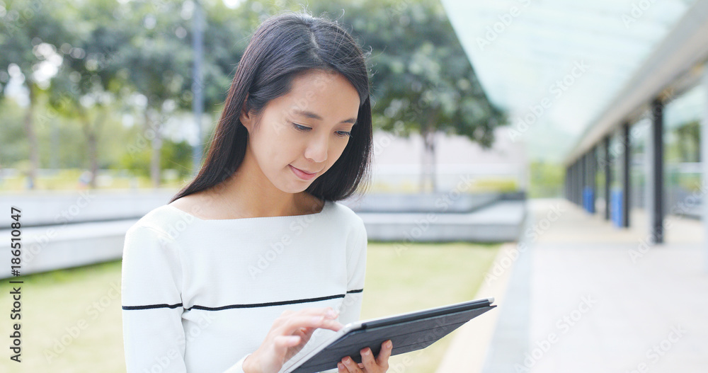 Asian Woman holding with digital tablet computer Asian Woman holding with digital tablet computer