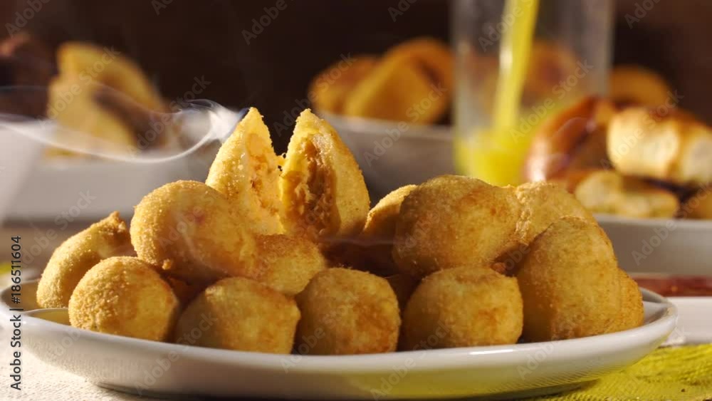 hot chicken snack with smoke. Brazilian snack slide shot. Coxinha. hot chicken snack with smoke. Brazilian snack slide shot. Coxinha.