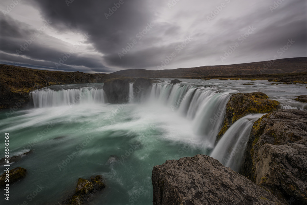 Dark clouds linger above Godafoss in Iceland Dark clouds linger above Godafoss in Iceland